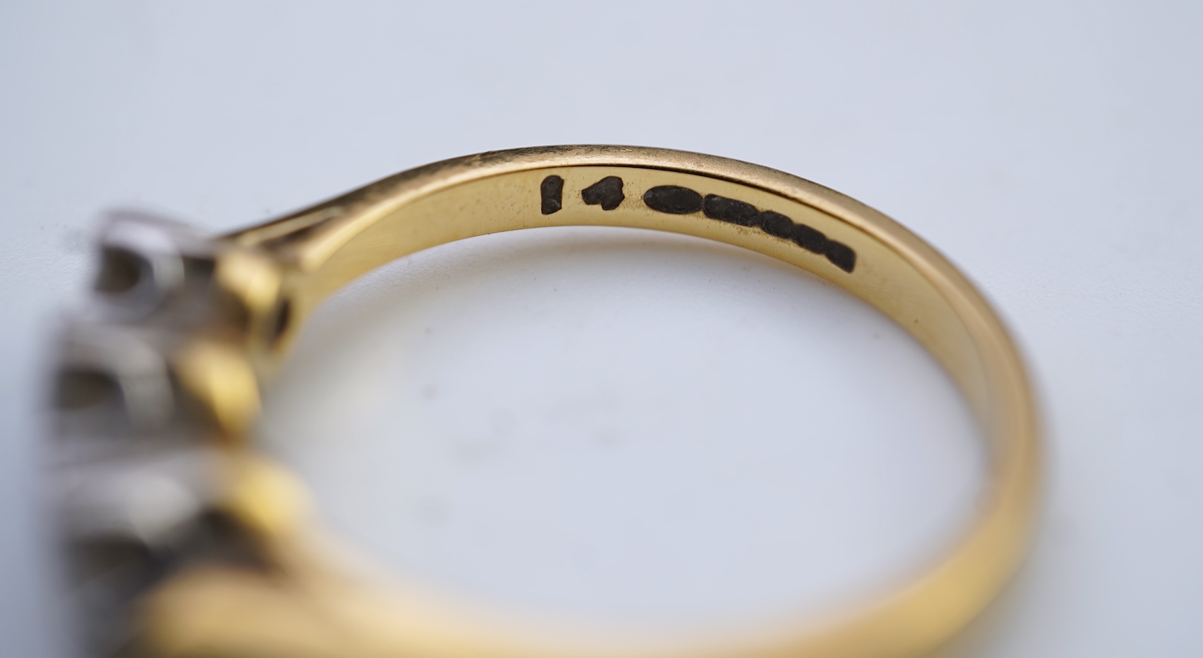 A three-stone diamond ring